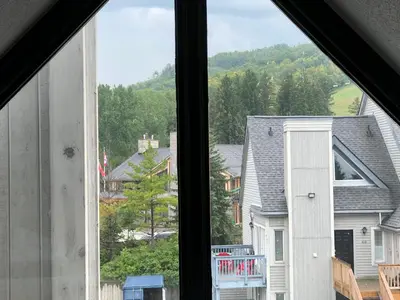 a view from a window of a house at Artistic Hillside Loft in Blue Mountains