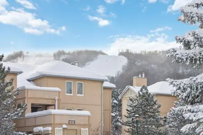 a house in the snow with snow covered trees at Blue Mountain, 3 BR - 108 Mountain Walk Chalet in Blue Mountains