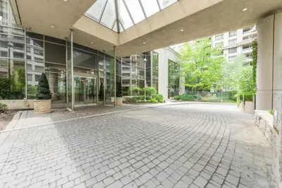 an empty courtyard in a building with glass windows at PlanURstay - Ideal 2 BR & 2BTH 3888 Duke of York Blvd in Mississauga