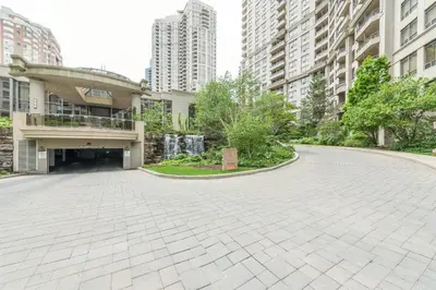 an empty street in a city with tall buildings at PlanURstay - Ideal 2 BR & 2BTH 3888 Duke of York Blvd in Mississauga