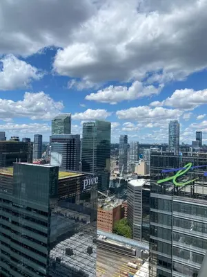 a view of a city with tall buildings at Toronto CN Tower Maple Leaf Square Luxurious 2 Bedroom Condo in Toronto