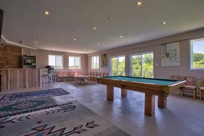 a large room with a pool table in it at Grand Villa Estate in Burlington