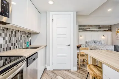 a kitchen with a sink and a counter top at Luxury Studio Getaway at Blue Mountains 80114 in Blue Mountains