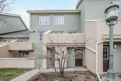 a house with a street light in front of it at Stunning Townhouse - 3 BDRM Blue Mountain Village Sauna! in Blue Mountains