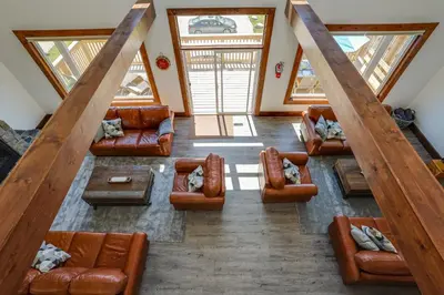 an overhead view of a living room with couches and tables at Luxury Mountain Retreat with private hot tub 82958 in Blue Mountains