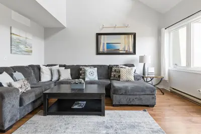 a living room with a couch and a coffee table at Mountain View Wintergreen Home 84140 in Blue Mountains