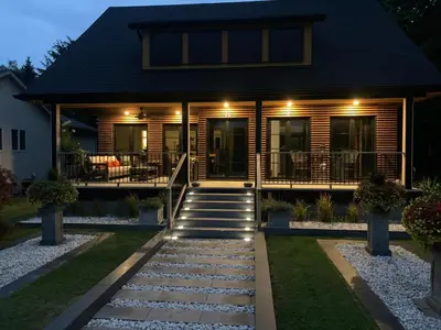 a house with a pathway leading to the front yard at 33 On Gage Garden Suite in Niagara on the Lake