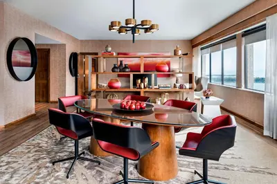 a dining room with a table and chairs at The Westin Harbour Castle, Toronto in Toronto