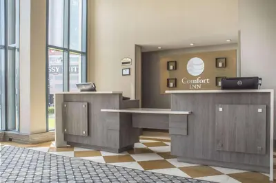 a waiting room with a counter in a building at Comfort Inn Fallsview in Niagara Falls