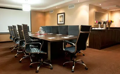a conference room with a table and chairs at Park Inn by Radisson Toronto-Markham in Markham
