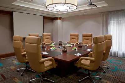 a conference room with a table and chairs at Residence Inn by Marriott Toronto Downtown / Entertainment District in Toronto
