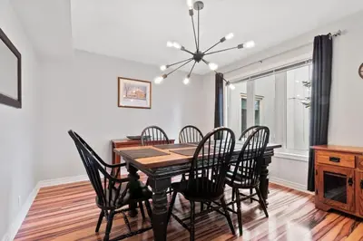 a dining room with a table and chairs at All Seasons Sierra Lane Retreat 88371 in Blue Mountains