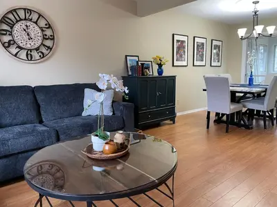 a living room with a couch and a table at Hammer Haus III in Waterloo