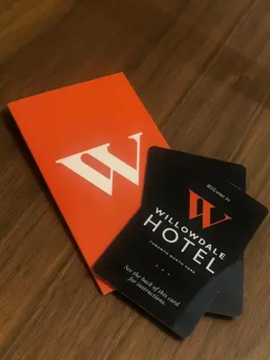 two books sitting next to each other on a table at Willowdale Hotel Toronto North York in Toronto