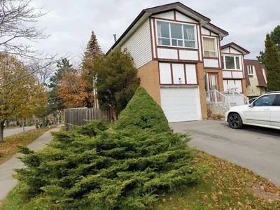 a christmas tree in front of a house at Private Rooms in House in North York Shared Kitchen in Toronto