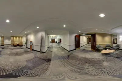a lobby of a hotel with a large room at Courtyard by Marriott Toronto Downtown in Toronto