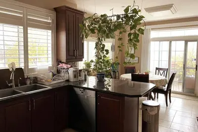 a kitchen with a sink and a counter top at Aurora Executive Upscale Residence Three Bedrooms Three and Half Bathrooms in Aurora