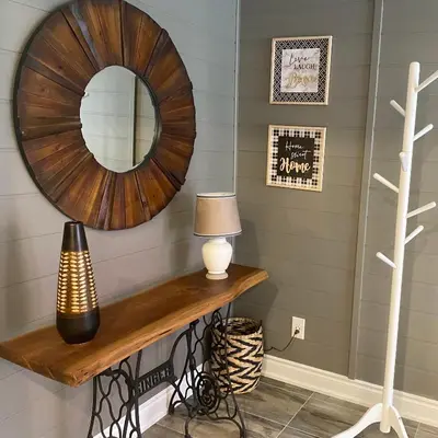 a mirror and a lamp on a table in a room at Luxurious and Spacious Apartment with 2 bedrooms and 2 Baths in Mississauga
