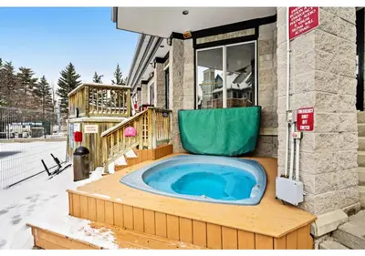 a jacuzzi tub in the middle of a building at Blue Heart Mountain Studio Dream Walk to slopes, tennis in Blue Mountains