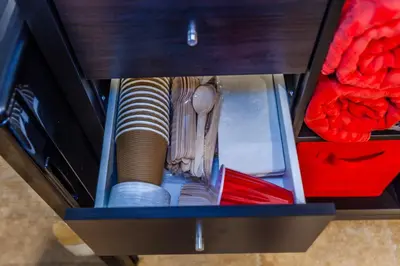 a drawer filled with dishes and utensils at Nature Oasis Bar Room in Dundas