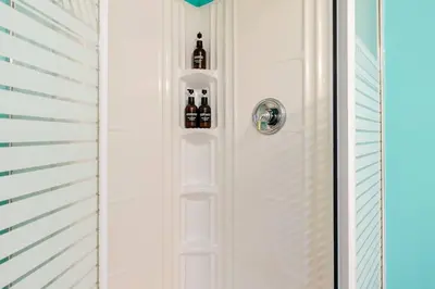 a door with three bottles of wine on it at The Rustic Barn in Brampton