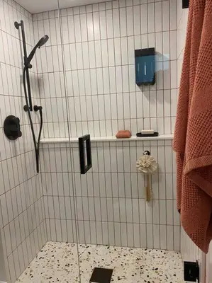 a shower with a glass door in a bathroom at Professionally Designed 1-Bedroom in Prime Toronto in Toronto