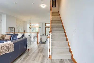 a staircase leading up to a bedroom in a house at The Parker House Gorgeous Light and Spacious Chalet 86100 in Blue Mountains