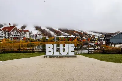 a large sign that says blue in front of a town at Condo 916 at North Creek Resort in Blue Mountains