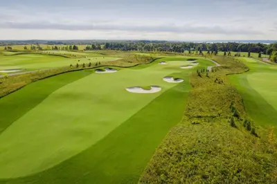 an overhead view of a golf course with several holes at PET FRIENDLY CONDOS at FRIDAY HARBOUR in Innisfil