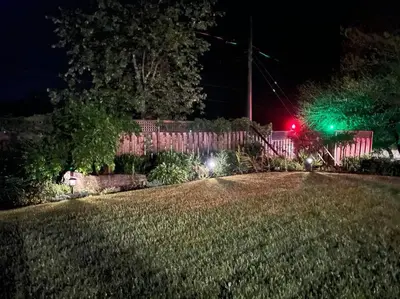 a street light and a yard at night at Muskoka Honey Harbour 4-Bed Retreat with Hot Tub in Honey Harbor