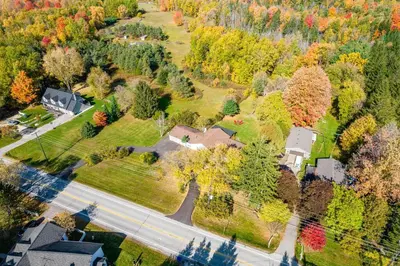 an overhead view of a house in a residential neighborhood at 5 Bedroom Vacation Cottage - King City in Schomberg