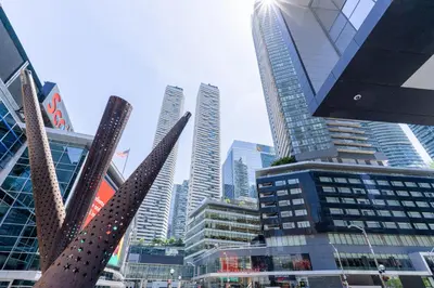 a group of tall buildings in a city at Beautiful Modern Toronto Luxurious Scotiabank Arena in Toronto