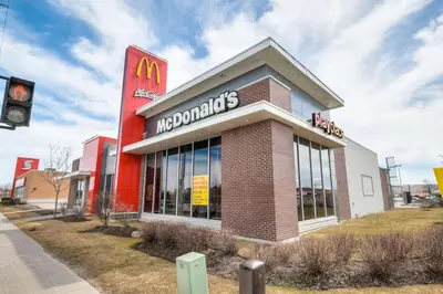 a mcdonalds restaurant on a street with a traffic light at The Ultimate Staycation in Bradford