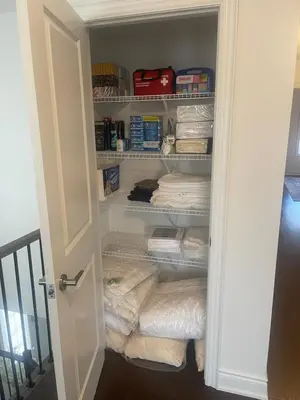 a closet filled with lots of towels at Unwind Here in a Stylish and Cozy Space in Bradford