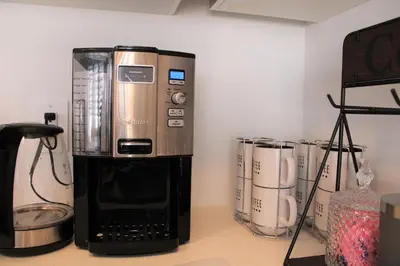 a coffee maker sitting on top of a counter at Modern Town House Barrie South in Barrie